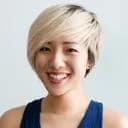 white woman smiling to the camera