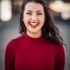 photo of white woman smiling to camera