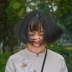 photo of smiling asian woman
