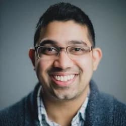 dark skin man smiling to the camera