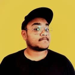 dark skin man looking at the camera