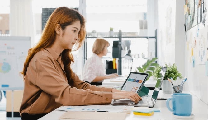 woman working on her laptop in the office